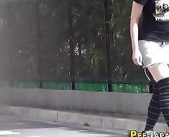 Asian teen pees outdoors