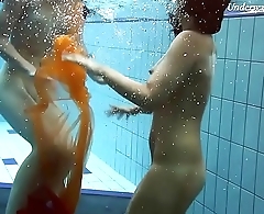 Two redheads swimming SUPER HOT!!!